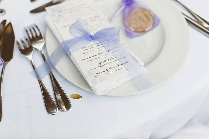 wedding invitations with purple ribbon