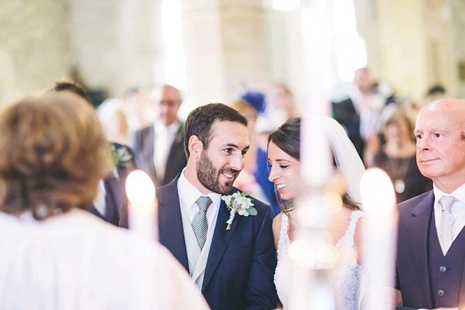 bride and groom first look in church cotswolds