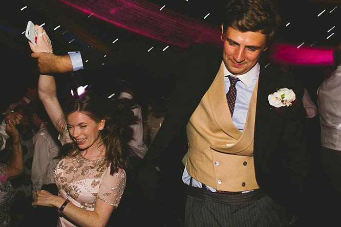 wedding guests wearing traditional tails