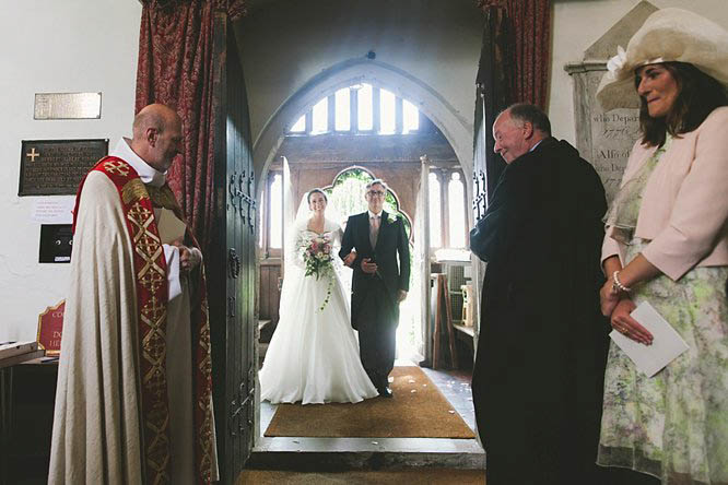 bride and her father entering church 