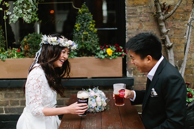 chinese couple having a pint in london