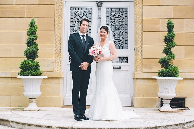 traditional photo bride groom on steps of french chateau