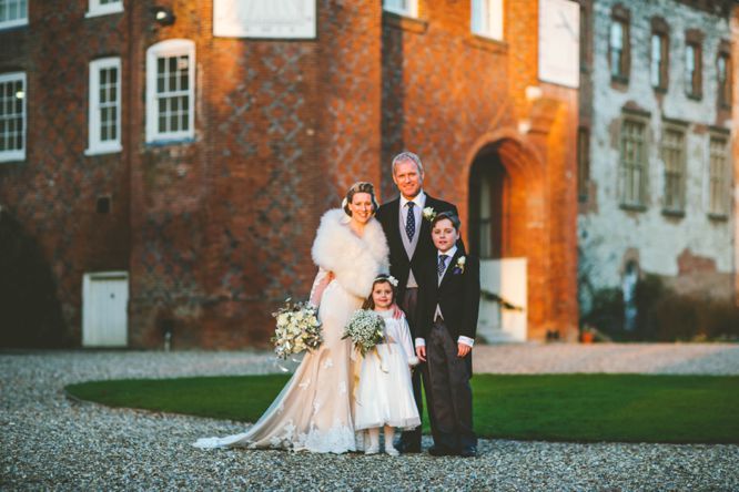 farnham castle winter wedding group formal photo