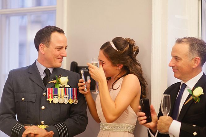 crying bridesmaid at wedding at royal society arts