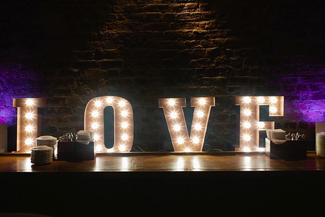 love wedding sign lit up dance floor 