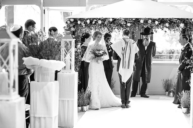 circling under the chuppah in a ceremony is an old jewish wedding tradition