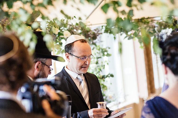 Sheva B’rachot or seven blessings at a Jewish wedding ceremony 